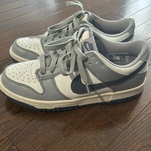 Grey and white sneakers